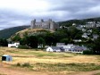 Royal St David's 18th green, clubhouse and Harlech Castle